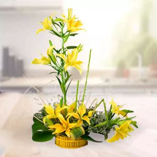 Special Arrangement of  5 Stem Yellow Lilies to India.