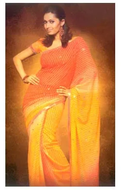 An Exclusive Georgette Saree with Orange and Yellow colour combination completed with all over prints and light sequins work on the body and the border. The saree is eye-catching for the woman who cares for simplicity with a touch of elegance.