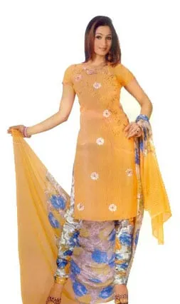 A Beautiful light orange colored dress material. The Salwar is designed with classic floral works in fabric accentuated with glitters. The dupatta and the bottom are done with matching floral prints.