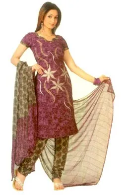 A beautiful violet coloured dress material. The Salwar is designed with classic floral works in fabric accentuated with glitters. The dupatta and the bottom are done with matching floral prints.