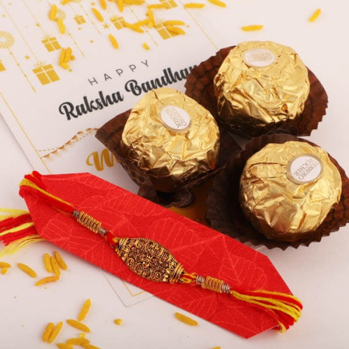 Charismatic Combo of Rakhi with Ferrero Chocolates, Free Roli Chawal and Wishes Card