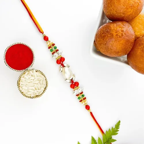 Gleaming Pearl Rakhi with Gulabjamun Treat