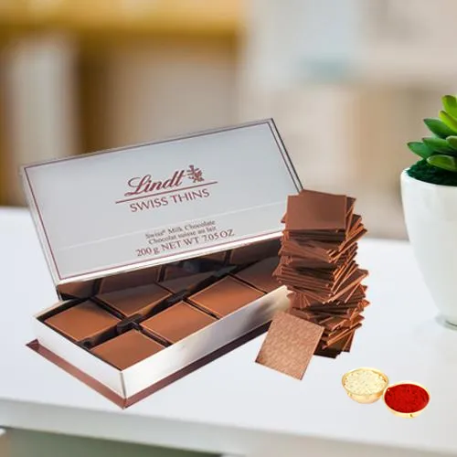 Lindt Swiss Thins with free Roli Tilak and Chawal.