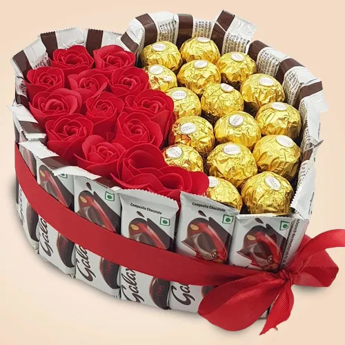 Fantastic Heart Arrangement of Imported Chocolates n Art Roses