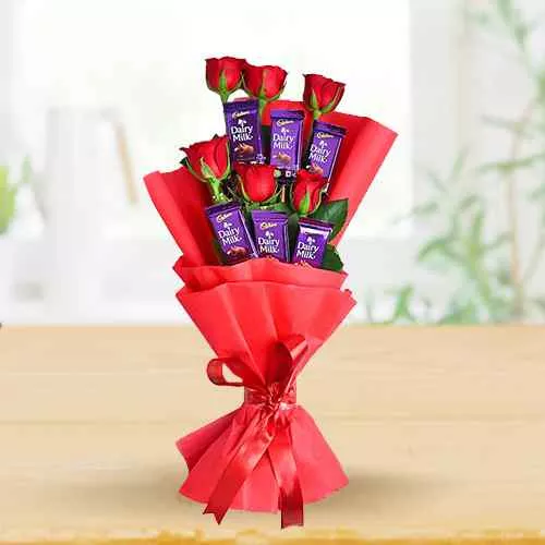 Send Red Roses n Dairy Milk Chocolate Arrangement