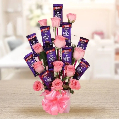 Marvelous Arrangement of Roses with Cadbury Dairy Milk Chocolates