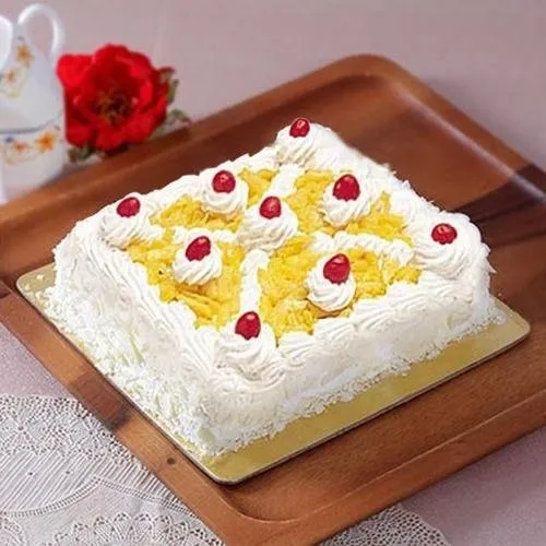 Order Tasty Eggless Pineapple cake for Mom 