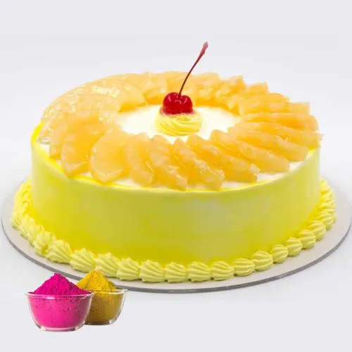 Fresh Baked Egg less Pineapple Cake 1Lbs .Filled with Soft Creams from top bakery in the city with free Gulal/Abir Pouch.