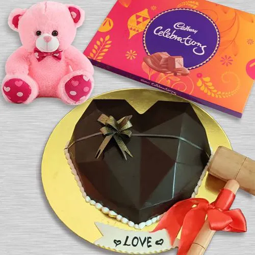 Wonderful Heart Shape Pinata Cake with Hammer Cadbury Celebrations n Teddy