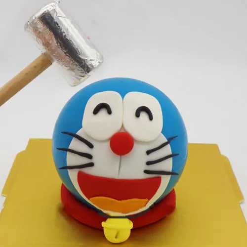Mouth-Watering Doremon Pinata Cake with Hammer