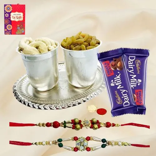 Delicious Dry Fruits Hamper in Silver Plated Glasses and Tray with Cadburys Dairy Milk Fruit n Nut