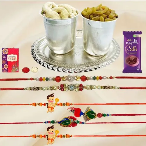 Delicious Dry Fruits Hamper in Silver Plated Glasses and Tray with Cadbury Dairy Milk Silk n Family Set Rakhi