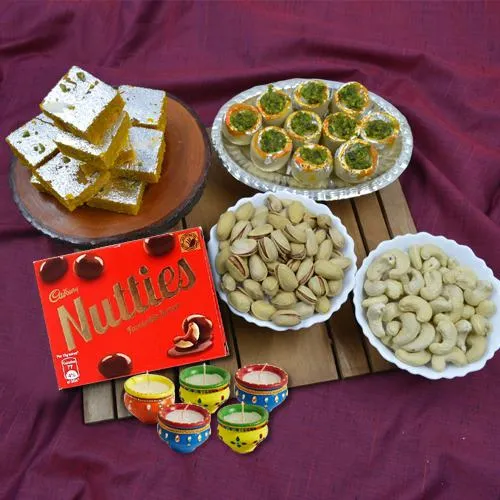 Tasty Haldiram Mithai n Dry Fruits Combo with Nutties n Wax Diya