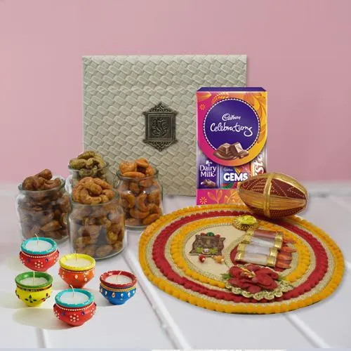 Alluring Gift of Thali with Flavored Cashew, Cadbury Chocolates n Diya