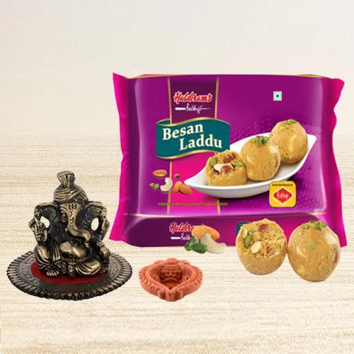 Crafty Metallic Pagdi Lord Ganesha on Round Base with Sweets N Free Diya