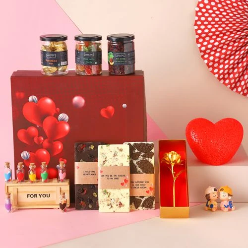 Scrumptious Hamper of Chocolates with Golden Rose N Assorted Gifts