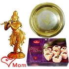 Intricate Krishna made of Sandalwood and Sweets Hamper