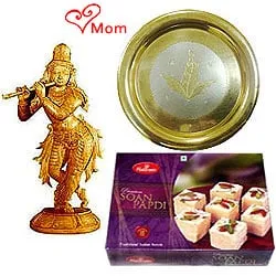 Intricate Krishna made of Sandalwood and Sweets Hamper