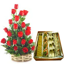 Order Assorted Sweets with Red Roses Basket Arrangement