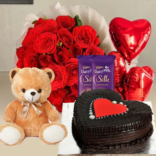 Elegant Red Roses, Chocolate Cake, Mylar Balloons, Chocolates and a Teddy