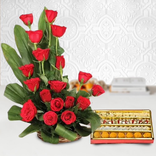 Haldirams Assorted Sweets with Red Roses Arrangement