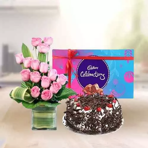 Perfect Combo of Cake Pink Roses Arrangement with Cadbury Celebrations