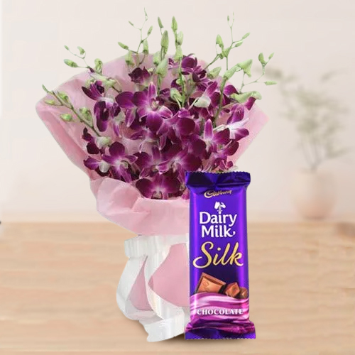 Gorgeous Bouquet of Orchids with Cadbury Dairy Milk Silk