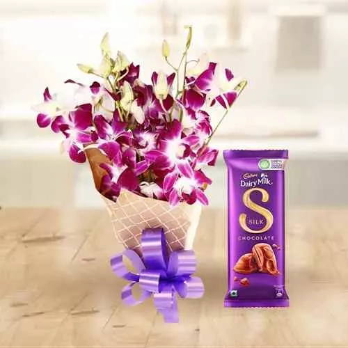 Deliver Bouquet of Orchids and Cadbury Dairy Milk Silk