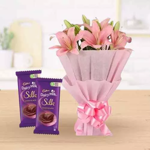 Online Pink Lilies Bouquet and Dairy Milk Silk