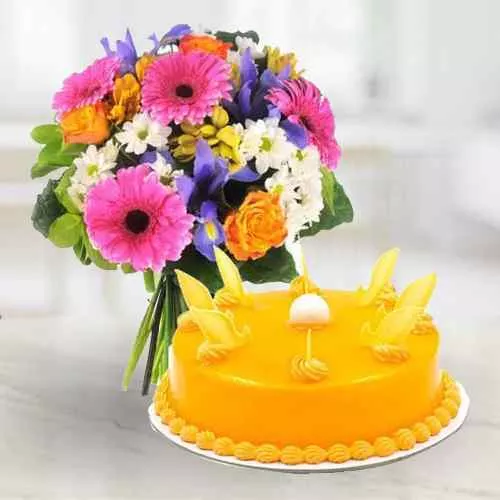Mesmerizing Bouquet of Mixed Flowers with Mango Cake