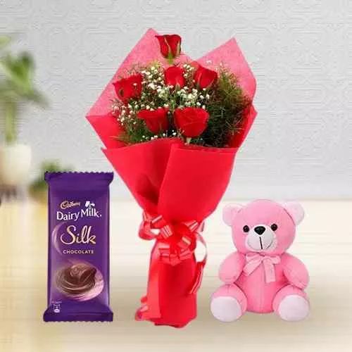 Eye Catching Red Roses Bouquet with Teddy N Cadbury Dairy Milk Silk