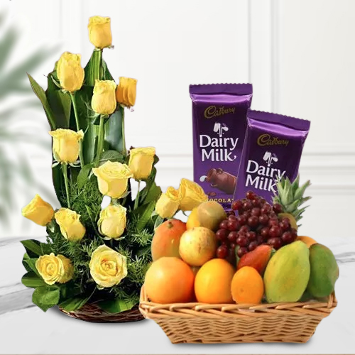 Gift of Mixed Fruits Basket with Roses Arrangement and Dairy Milk Silk
