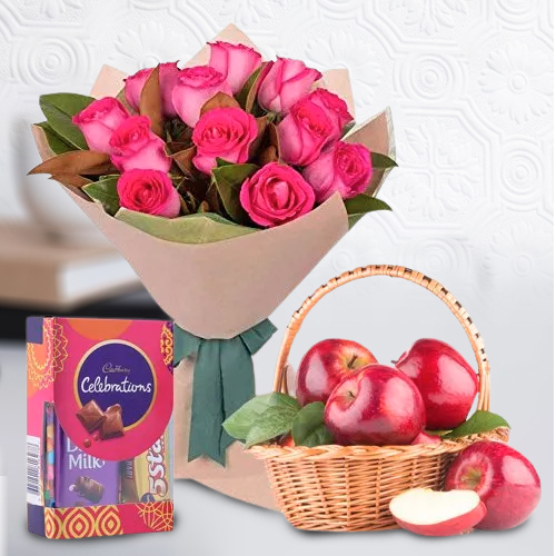 Tangy Bunch of Pink Roses with Dairy Milk Celebration and Apples Basket