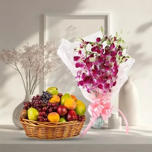 Delectable Fresh Fruits Basket with Orchids Bouquet