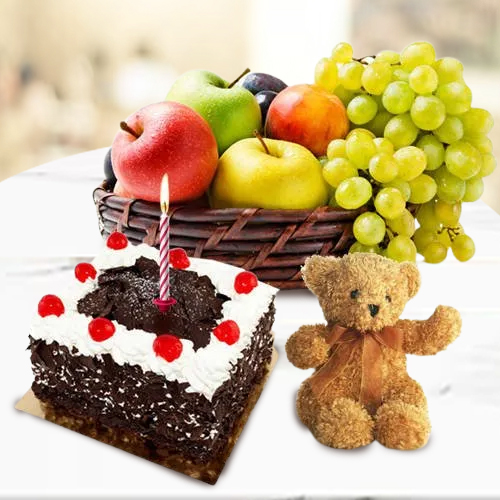 Deliver Fresh Fruits Basket with Teddy, Candles and Black Forest Cake