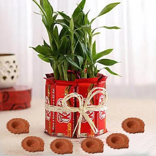 Diya with 2 Tier Lucky Bamboo N Kitkat Arrangement