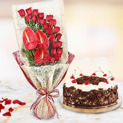 Captivating Red Roses n Anthodium Bouquet with Black Forest Cake