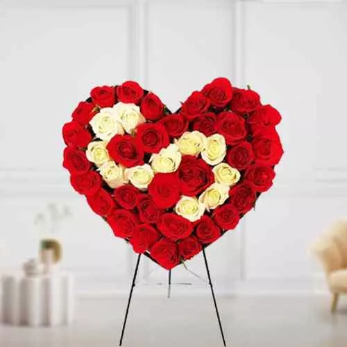 Lovely Heart Shape Arrangement of Red  N  White Roses