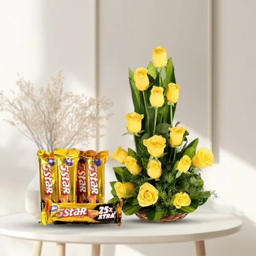 Sun Kissed Yellow Roses Bouquet in Cane Basket with Cadbury 5 Star