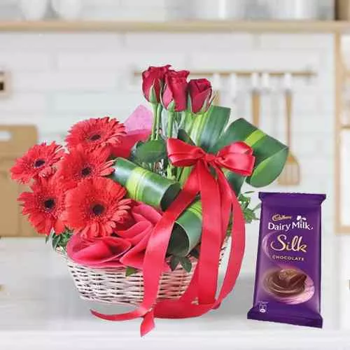 Sensational Basket of Red Flowers with Cadbury Chocolates