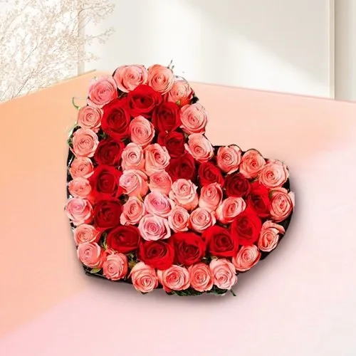 Lovely Heart Shape Arrangement of 50 Mixed Roses