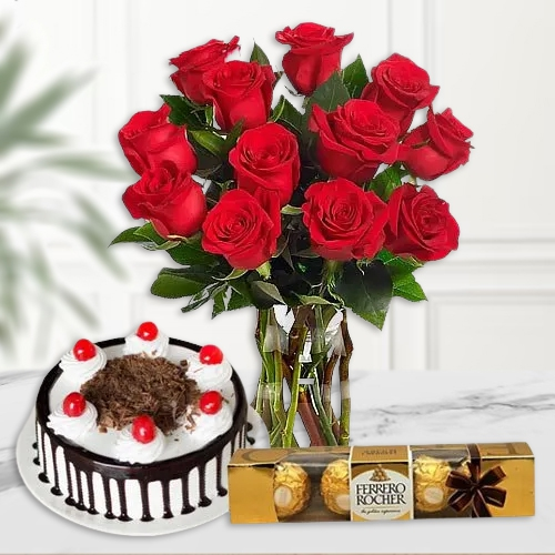 Marvelous Bouquet of Red Roses with Ferrero Rocher and Black Forest Cake