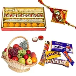 Assorted Cadburys Chocolates with Kaju Katli, Fresh Fruit Basket,1 Free Rakhi