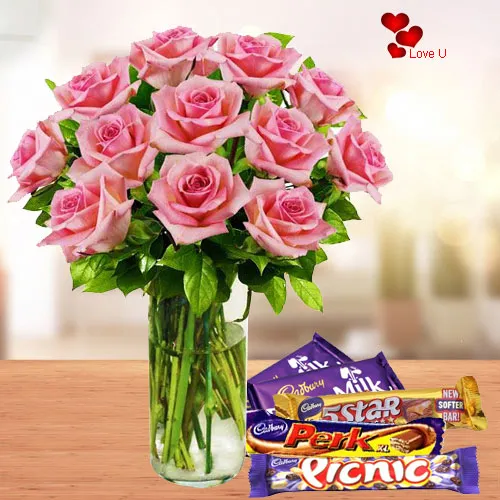 Buy Assorted Chocolates with Pink Roses in a Vase for Rose Day