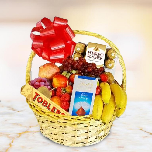 Enticing Basket of Fresh Fruits N Chocolates