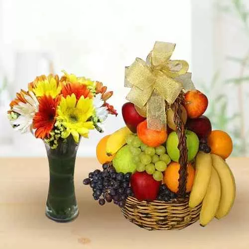 Deliver Fresh Fruits Basket with Gerberas in Glass Vase