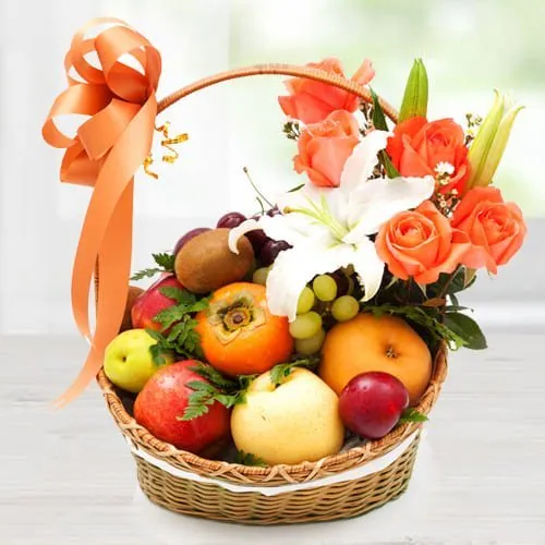 Send Beautiful Imported Fruits Basket with Orange Roses n White Lily