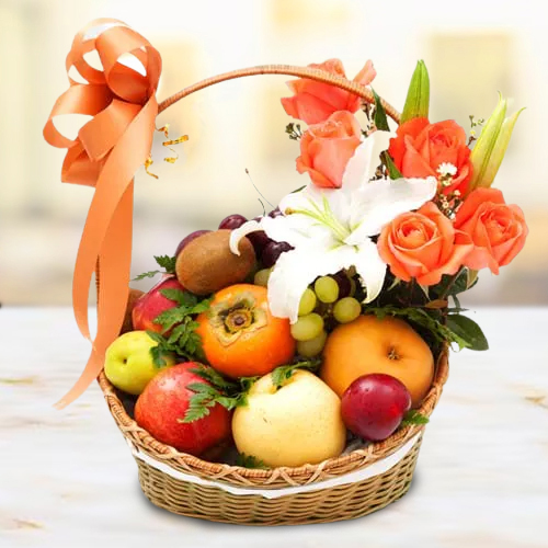 Luscious Imported Fruits Basket with Orange Roses n White Lily