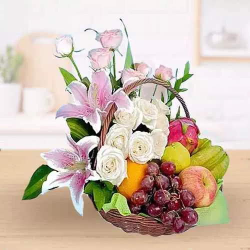 Elegant Fresh Fruits Basket decorated with Lily and Roses