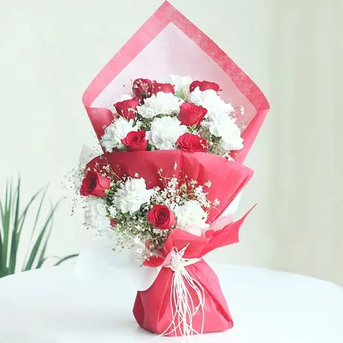 Awesome Roses n Carnation Bouquet in Tissue Wrap